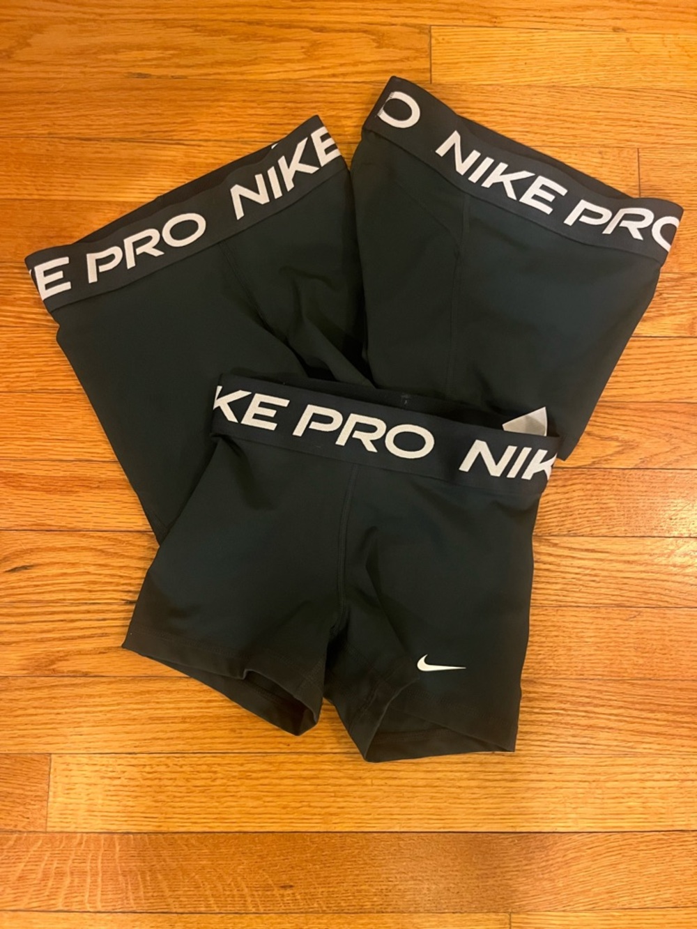 Nike Pro Compression Shorts with White Branding.